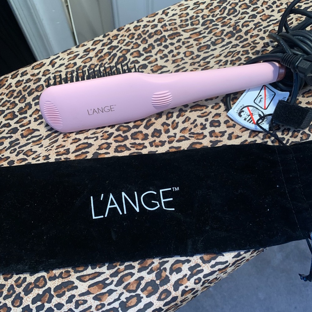 Lange straightening brush.  Like brand new.